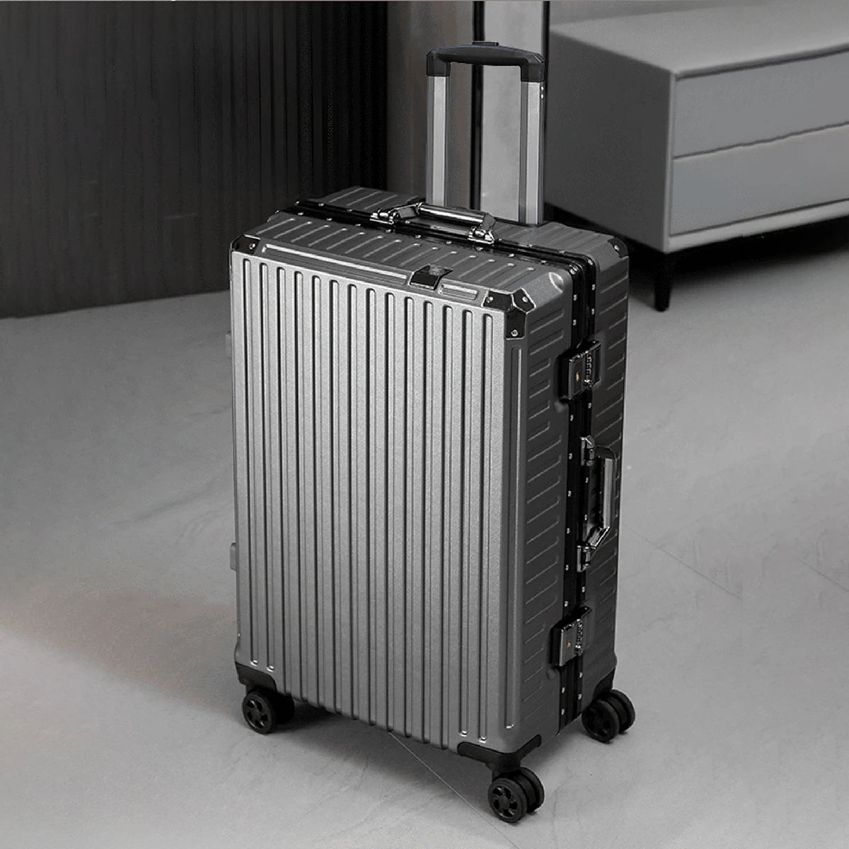 Dark gray rolling suitcase — original supplier image